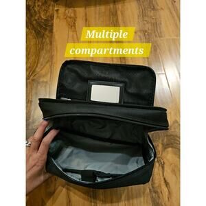Duluth Tolitery Bag. Multiple pockets w mirror. And, extra clear pouch. Embroide